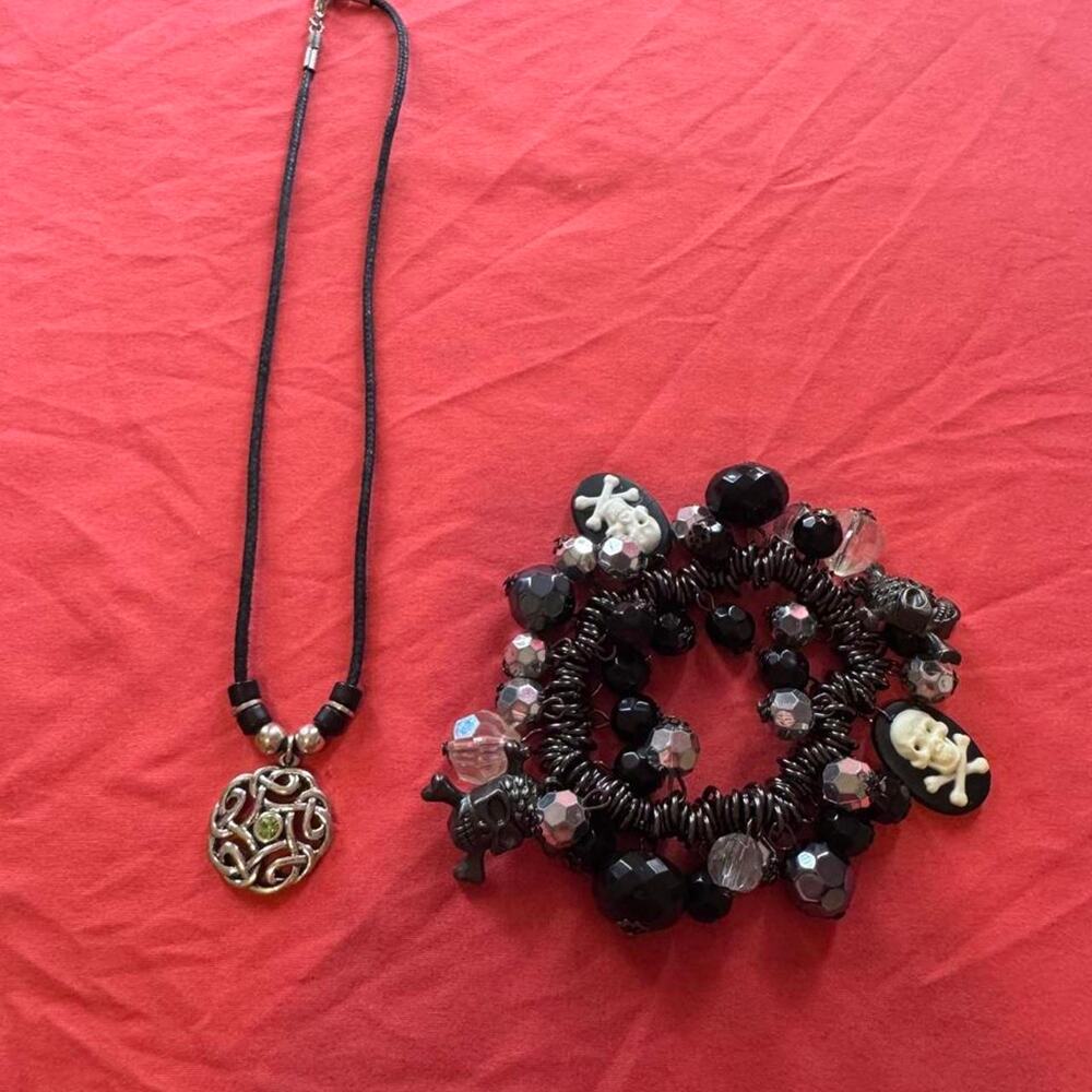 Bundle of black rope necklace w/silver toned pendant &all black &silver bracelet